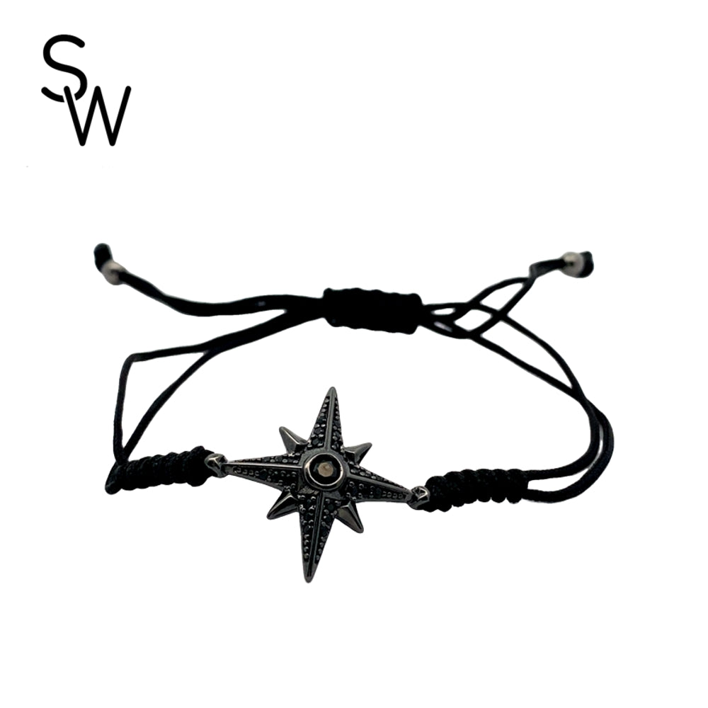 
                      
                        B5437 8IN MACRAME BRCLT WTH BLK RD NRTHSTR SDE N MID RND CZ 3.1G
                      
                    