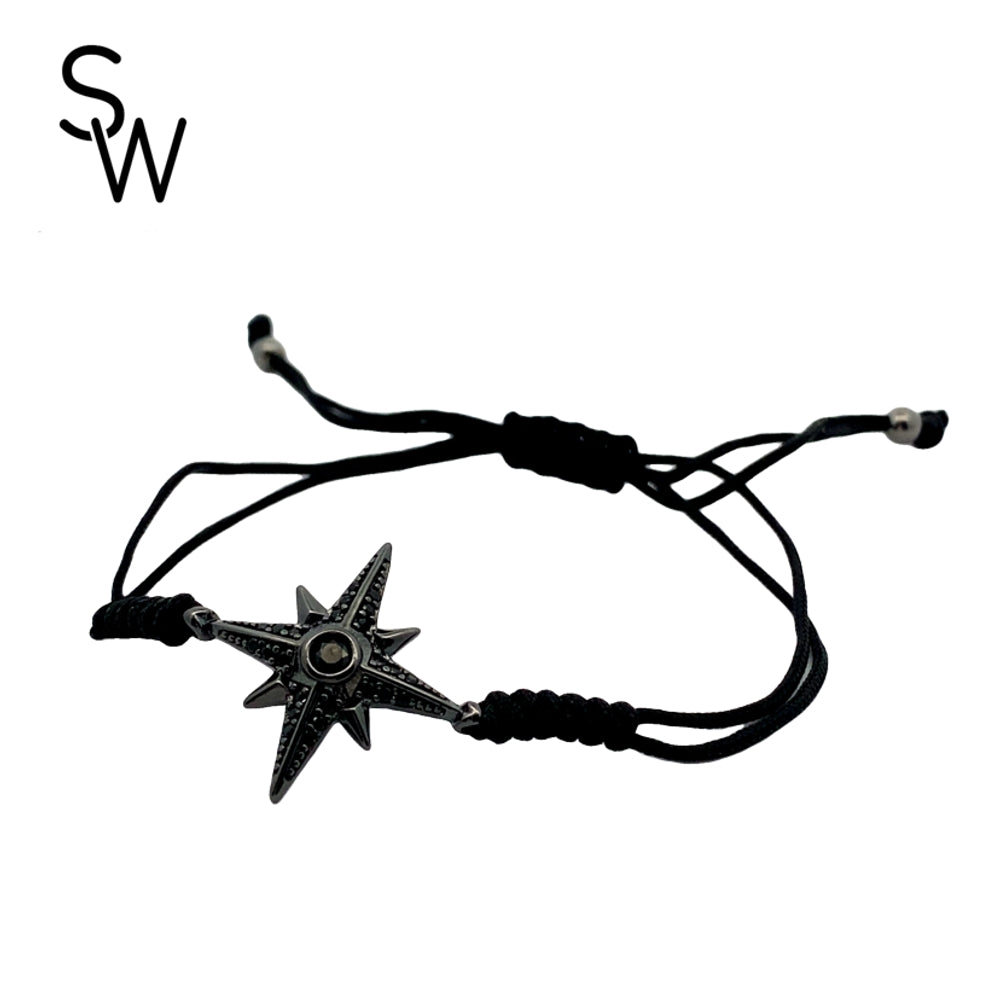 
                      
                        B5437 8IN MACRAME BRCLT WTH BLK RD NRTHSTR SDE N MID RND CZ 3.1G
                      
                    