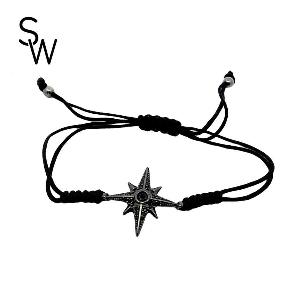 
                      
                        B5437 8IN MACRAME BRCLT WTH BLK RD NRTHSTR SDE N MID RND CZ 3.1G
                      
                    