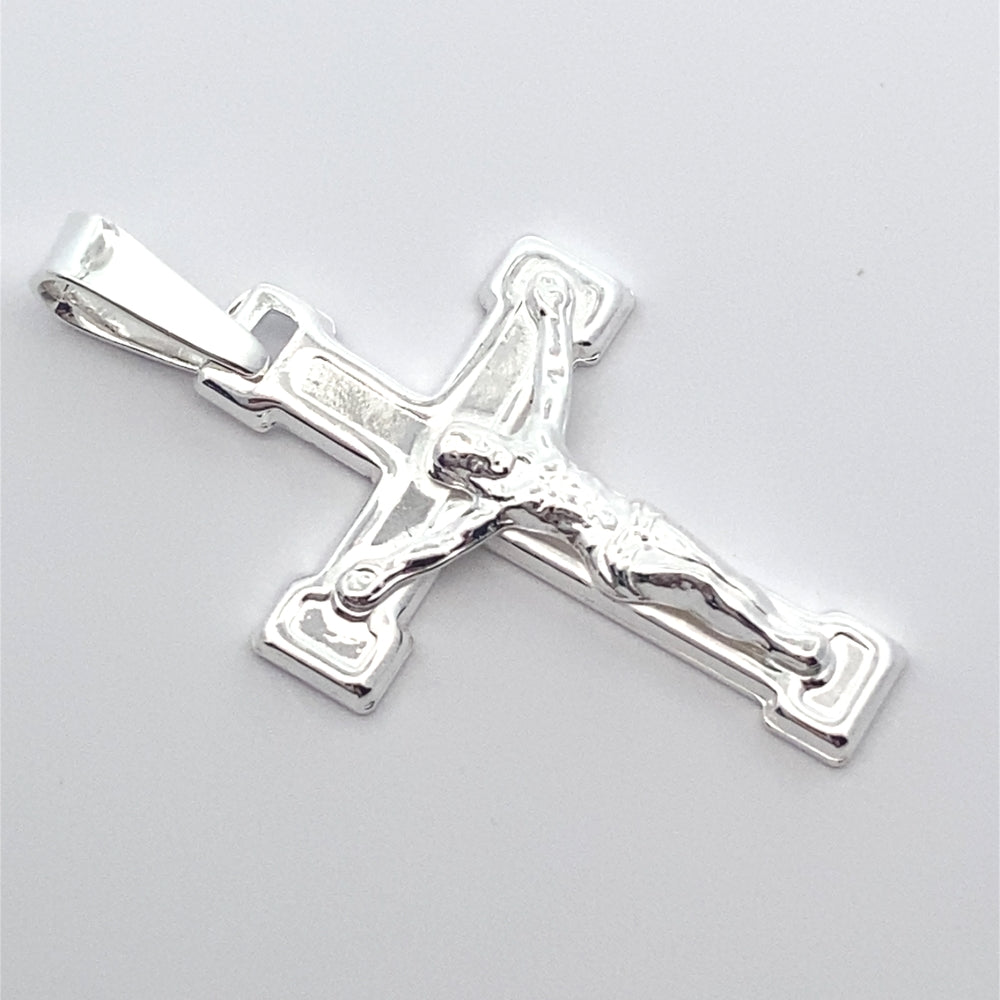 
                      
                        C5035 17X31MM EMBOSSED SILVER CROSS W/JC 1.04G
                      
                    