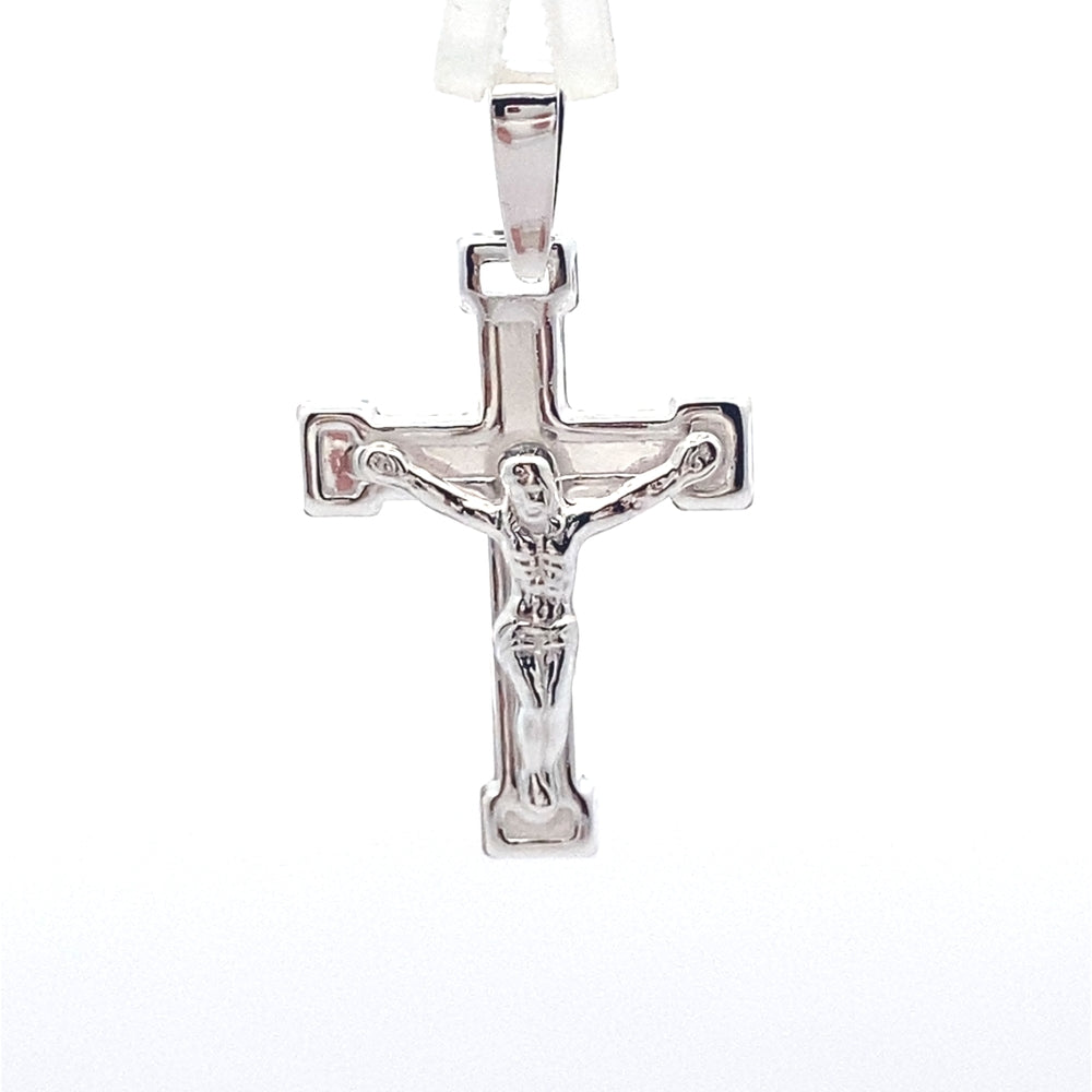 C5035 17X31MM EMBOSSED SILVER CROSS W/JC 1.04G