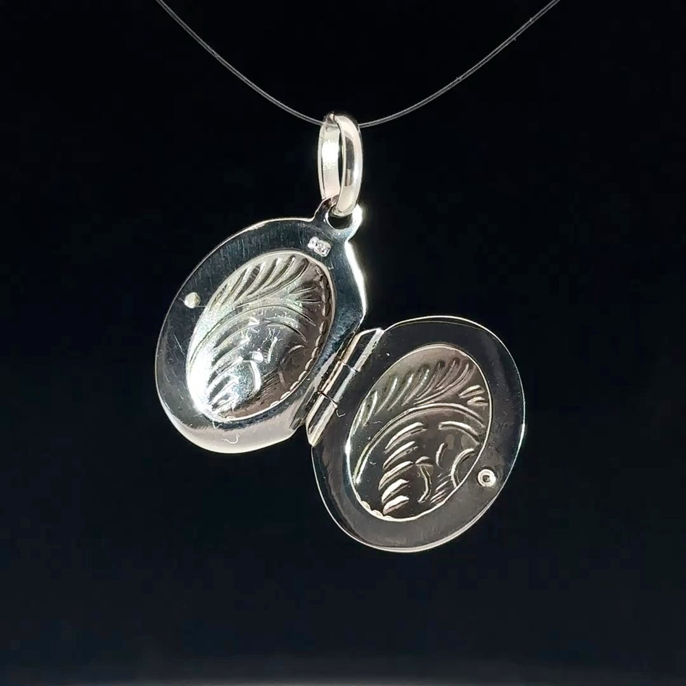 
                      
                        C5232 SLVR 18MM LINE TREE DSGND OVAL LOCKET 2.9G
                      
                    