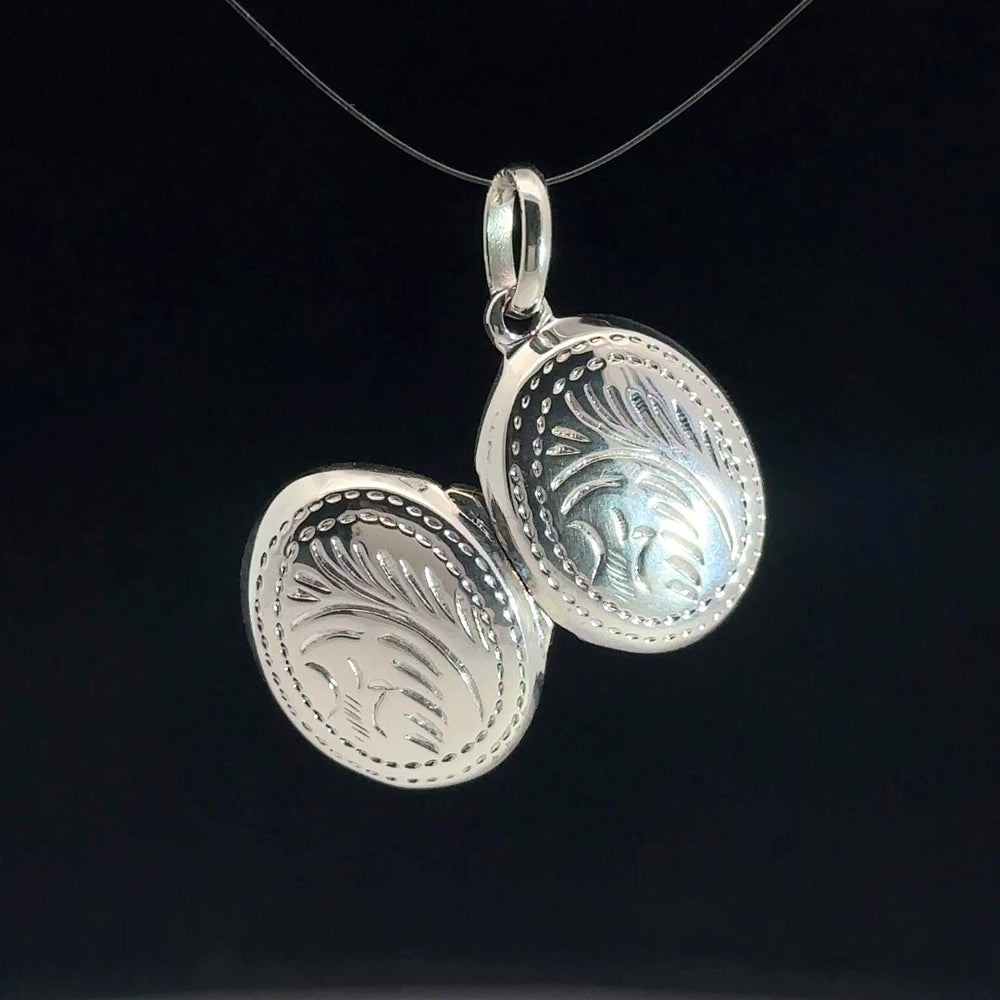 
                      
                        C5232 SLVR 18MM LINE TREE DSGND OVAL LOCKET 2.9G
                      
                    