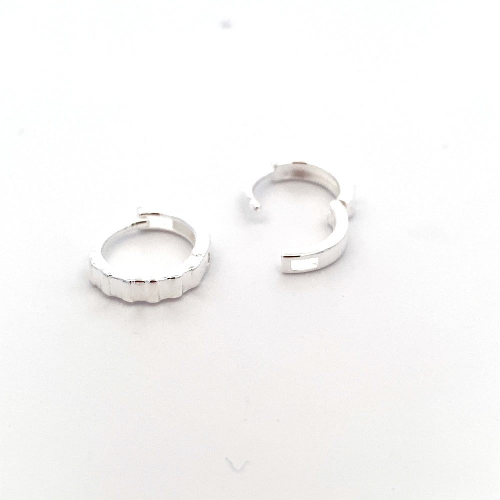 
                      
                        E7641 TEXTURED HUGGIES 2X11MM SE 1.12G
                      
                    