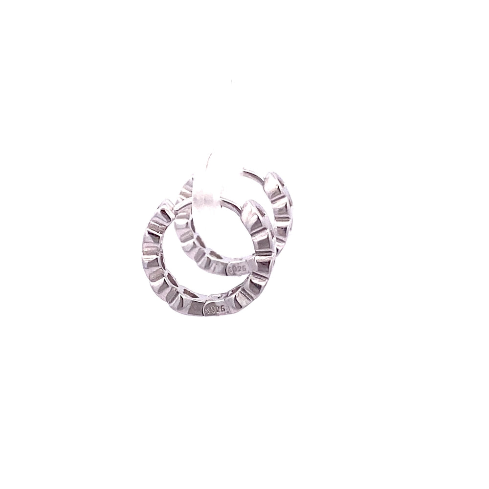 
                      
                        E8040 SILVER PLN AND WTH CZ PTTRND CHAIN HOOP EARRNG 3.45G
                      
                    