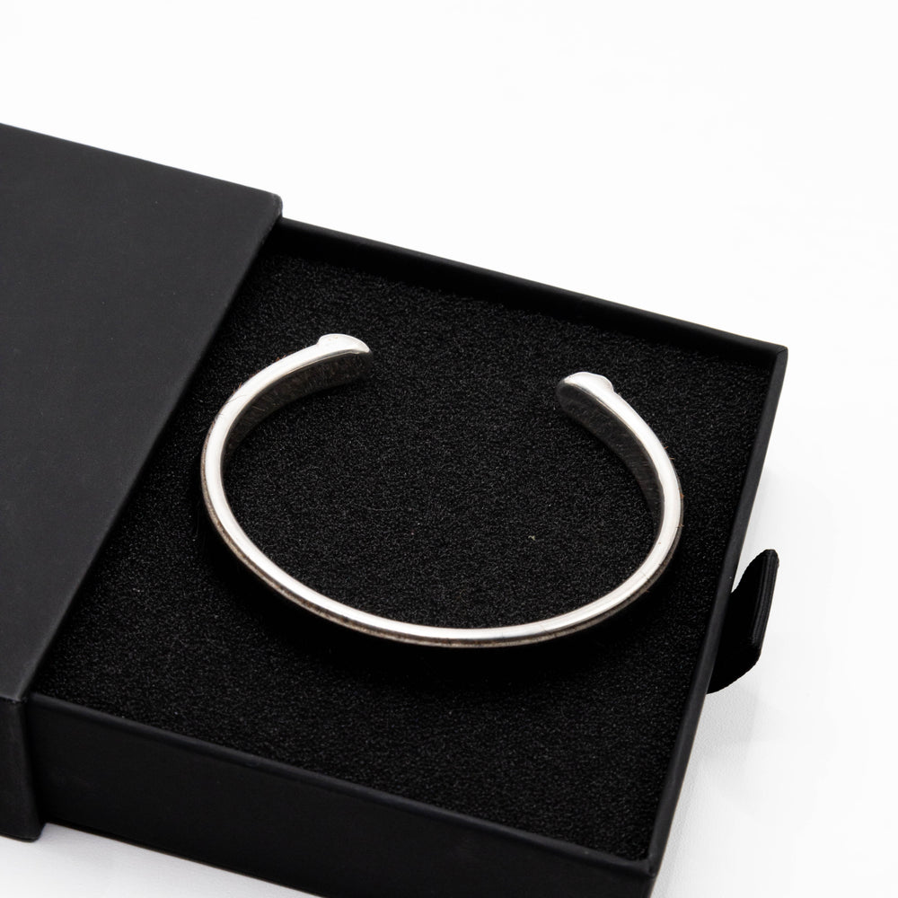 
                      
                        Jaime Black 925 Sterling Silver Bangle Bracelet | SilverWorks
                      
                    