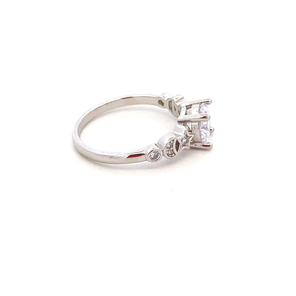 
                      
                        R64518 4PRNG RND CZ W/CZ STAR,MOON ON SIDES R
                      
                    