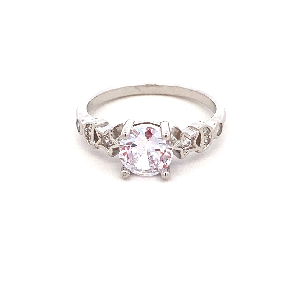 
                      
                        R64518 4PRNG RND CZ W/CZ STAR,MOON ON SIDES R
                      
                    