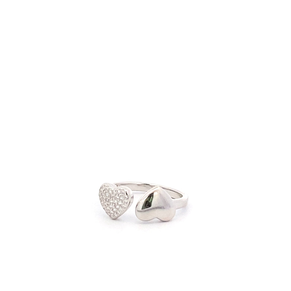 
                      
                        R6606 ADJ SLVR RVRSD HRT RING 1PLAIN AND 1FULL CZ
                      
                    