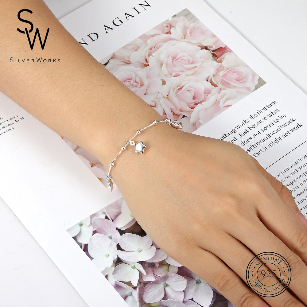 
                      
                        Emily 925 Sterling Silver Charm Bracelet | SilverWorks
                      
                    